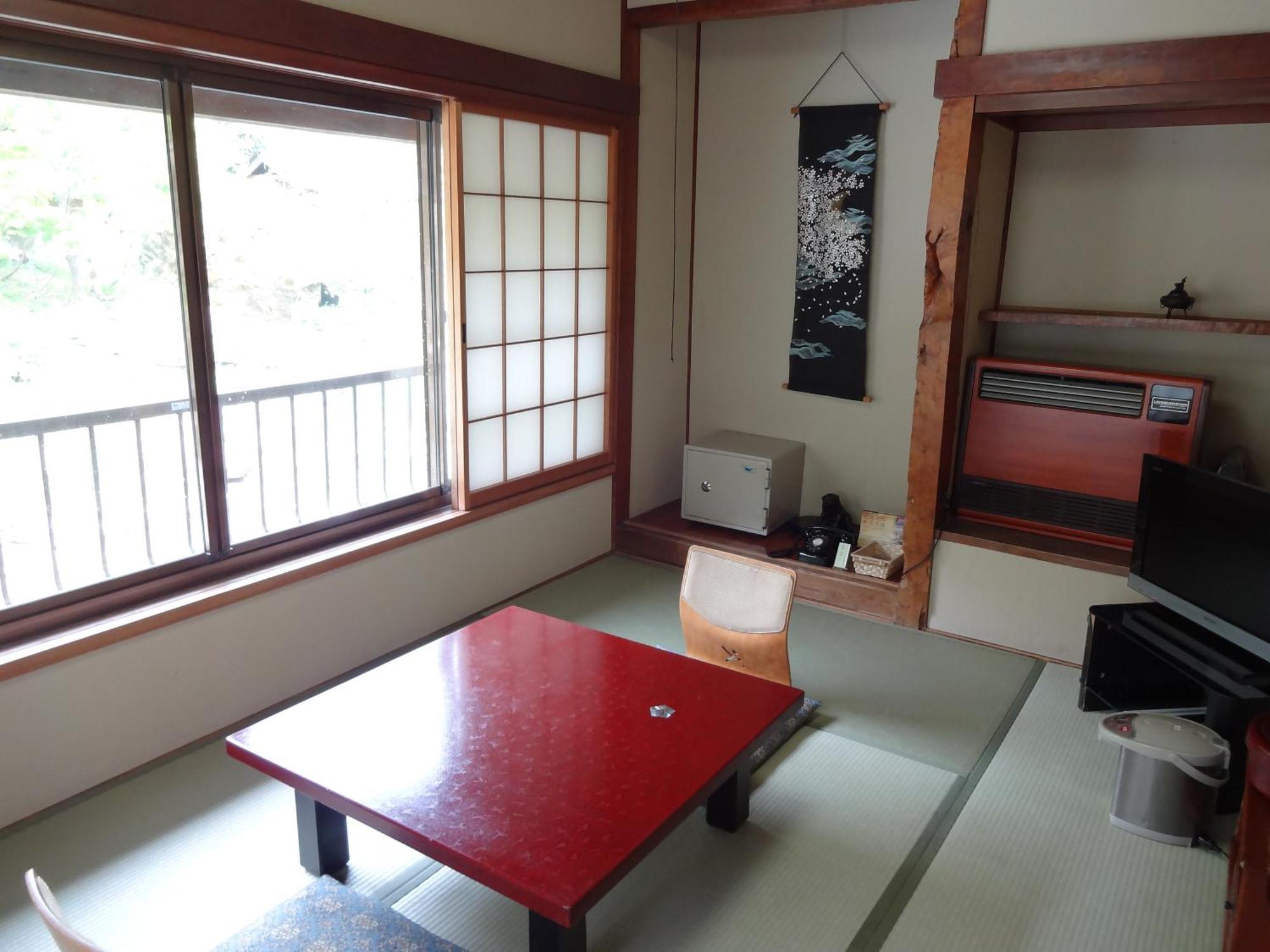 Готель Takaragawa Onsen Ousenkaku Мінакамі Номер фото